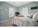 Cozy bedroom with calm paint, shuttered windows, and a comfortable bed, creating a peaceful retreat at 3075 Maritime Forest Dr, Johns Island, SC 29455