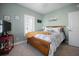 Inviting bedroom offers great natural light, a comfortable bed, and stylish décor at 3075 Maritime Forest Dr, Johns Island, SC 29455