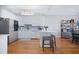 Kitchen with white cabinets, stainless steel appliances, and a center island with bar stool seating at 3075 Maritime Forest Dr, Johns Island, SC 29455