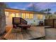 Inviting backyard with wooden deck, outdoor seating, and a grill perfect for entertaining or relaxing at 3304 Hartnett Blvd, Isle of Palms, SC 29451