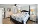 Cozy bedroom featuring a four poster bed and neutral decor at 3304 Hartnett Blvd, Isle of Palms, SC 29451
