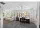 Bright sunroom with lots of windows, lots of light and plank flooring at 3304 Hartnett Blvd, Isle of Palms, SC 29451