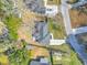 An aerial view of the property showcases its well-maintained yard, long driveway, and established trees at 3552 Old Ferry Rd, Johns Island, SC 29455