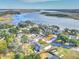 Breathtaking aerial view of a charming waterfront neighborhood nestled along a serene river at 3552 Old Ferry Rd, Johns Island, SC 29455
