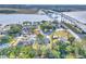 Panoramic aerial showcasing a vibrant community near a tranquil river and expansive bridge at 3552 Old Ferry Rd, Johns Island, SC 29455