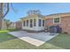 Backyard featuring a grilling station, patio area and access to the sunroom at 3552 Old Ferry Rd, Johns Island, SC 29455
