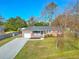 Charming single-story brick home featuring a well-manicured lawn and a large driveway at 3552 Old Ferry Rd, Johns Island, SC 29455