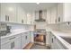 Modern kitchen featuring stainless steel appliances, subway tile backsplash, and custom cabinetry at 3552 Old Ferry Rd, Johns Island, SC 29455