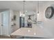 Gourmet kitchen with quartz countertops, stainless appliances, and sleek white cabinetry at 3552 Old Ferry Rd, Johns Island, SC 29455