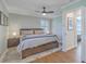 Comfortable main bedroom with a ceiling fan, and hardwood flooring at 3552 Old Ferry Rd, Johns Island, SC 29455