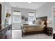 Bedroom with hardwood furniture, grey carpet, and plenty of natural light from the windows at 4029 Cascades Thrust, Summerville, SC 29483