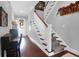 Inviting foyer with hardwood floors, a staircase, and a view of the front door and entry at 4029 Cascades Thrust, Summerville, SC 29483