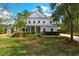 Charming two-story home with a welcoming front porch and meticulously landscaped front yard at 4029 Cascades Thrust, Summerville, SC 29483