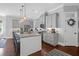 Modern kitchen with gray cabinets, granite countertops, and stainless steel appliances, creating a stylish cooking space at 4029 Cascades Thrust, Summerville, SC 29483