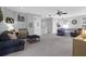 Expansive living room with comfortable seating, neutral tones, and lots of room for activities at 4029 Cascades Thrust, Summerville, SC 29483