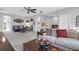 Open living area with plush sofas, a ceiling fan, and ample seating for relaxation and gatherings at 4029 Cascades Thrust, Summerville, SC 29483