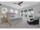 Spacious main bedroom featuring natural light, ceiling fan, and a comfortable bed and furniture at 4029 Cascades Thrust, Summerville, SC 29483