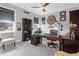 Home office featuring a ceiling fan, desk, bookshelves, and a cozy reading chair at 4029 Cascades Thrust, Summerville, SC 29483