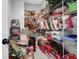 Organized storage room with shelving units filled with holiday decorations and household items at 4029 Cascades Thrust, Summerville, SC 29483
