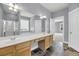Spacious bathroom featuring a double vanity, tiled flooring, and a separate shower at 412 Hydrangea St, Summerville, SC 29483