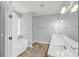 Bathroom featuring a soaking tub, double vanity, and separate shower at 412 Hydrangea St, Summerville, SC 29483