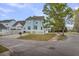 Charming home with a well-manicured lawn and white picket fence for a classic curb appeal at 412 Hydrangea St, Summerville, SC 29483