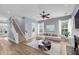 Inviting living room with hardwood floors, neutral tones, and a cozy ambiance at 412 Hydrangea St, Summerville, SC 29483