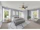 Serene main bedroom with ample natural light, ceiling fan, and neutral decor at 412 Hydrangea St, Summerville, SC 29483