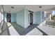 Welcoming front porch with a black front door and light-blue walls at 412 Hydrangea St, Summerville, SC 29483