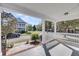 Inviting front porch view with white railing and a glimpse of the neighborhood street at 412 Hydrangea St, Summerville, SC 29483