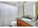 Bathroom with a vanity, mirror, shower, and toilet at 4418 Hardwood St, Ladson, SC 29456