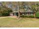 Traditional brick home with tidy landscaping and a welcoming entrance at 4418 Hardwood St, Ladson, SC 29456