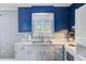 This kitchen boasts a stainless steel sink and a window above it at 4418 Hardwood St, Ladson, SC 29456