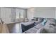 Comfortable living room with sectional sofa, hardwood floors, and natural light at 4418 Hardwood St, Ladson, SC 29456