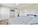 Bedroom with a bed with a comforter, and a large closet with white doors at 4418 Hardwood St, Ladson, SC 29456