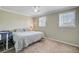 Comfortable bedroom with neutral walls, a ceiling fan, and plush carpeting at 4418 Hardwood St, Ladson, SC 29456