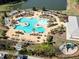 The resort-style pool area offers cabanas, lounge chairs, tables, and a splashpad for residents to enjoy at 449 Whispering Breeze Ln, Summerville, SC 29486