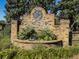 The Lindera Preserve neighborhood is clearly marked by a brick entrance sign and lush landscaping at 449 Whispering Breeze Ln, Summerville, SC 29486