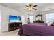 Main bedroom features a dresser, television, soft carpet, and lots of natural light at 449 Whispering Breeze Ln, Summerville, SC 29486