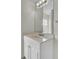 Well lit bathroom featuring a large mirror above a white vanity with chrome faucet at 4512 Great Oak Dr, North Charleston, SC 29418