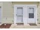 Exterior door featuring sidelights and decorative trim at 4512 Great Oak Dr, North Charleston, SC 29418
