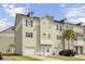A charming townhome featuring a two car garage, dormer windows, and a well maintained yard at 4512 Great Oak Dr, North Charleston, SC 29418