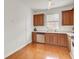 Kitchen features wood cabinets, stainless steel appliances, and natural light from the window at 4512 Great Oak Dr, North Charleston, SC 29418