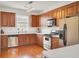 Modern kitchen with stainless steel appliances and hardwood floors at 4512 Great Oak Dr, North Charleston, SC 29418