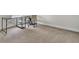 A carpeted office with a desk and chair at 4512 Great Oak Dr, North Charleston, SC 29418