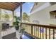 Spacious patio with outdoor furniture, potted plants, and a view of the backyard at 4512 Great Oak Dr, North Charleston, SC 29418