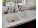 Close-up of the kitchen sink features stainless steel fixtures and a bright, clean countertop at 4512 Great Oak Dr, North Charleston, SC 29418