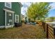 Green backyard with a shed, outdoor seating, and a patio area, perfect for relaxing at 5132 E Liberty Park Cir, North Charleston, SC 29405