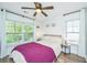 Bright bedroom with hardwood floors, natural light, and a cozy, comfortable atmosphere at 5132 E Liberty Park Cir, North Charleston, SC 29405