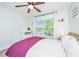Bright bedroom with hardwood floors, natural light, and a cozy, comfortable atmosphere at 5132 E Liberty Park Cir, North Charleston, SC 29405